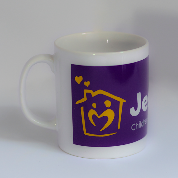 Jessie May Mug featuring Jessie May logo