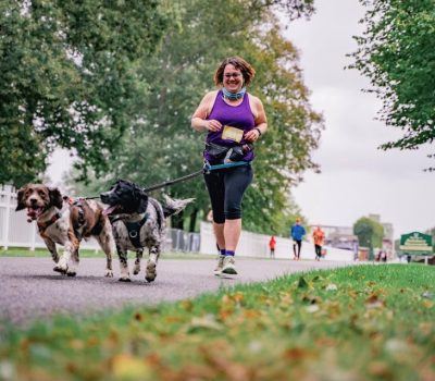 Jessie May runner, Gayle Lui running with her spaniels at Cairnicross